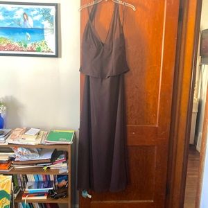 Backless.Worn once.Excellent condition,wore it for my son’s wedding. Small 14.